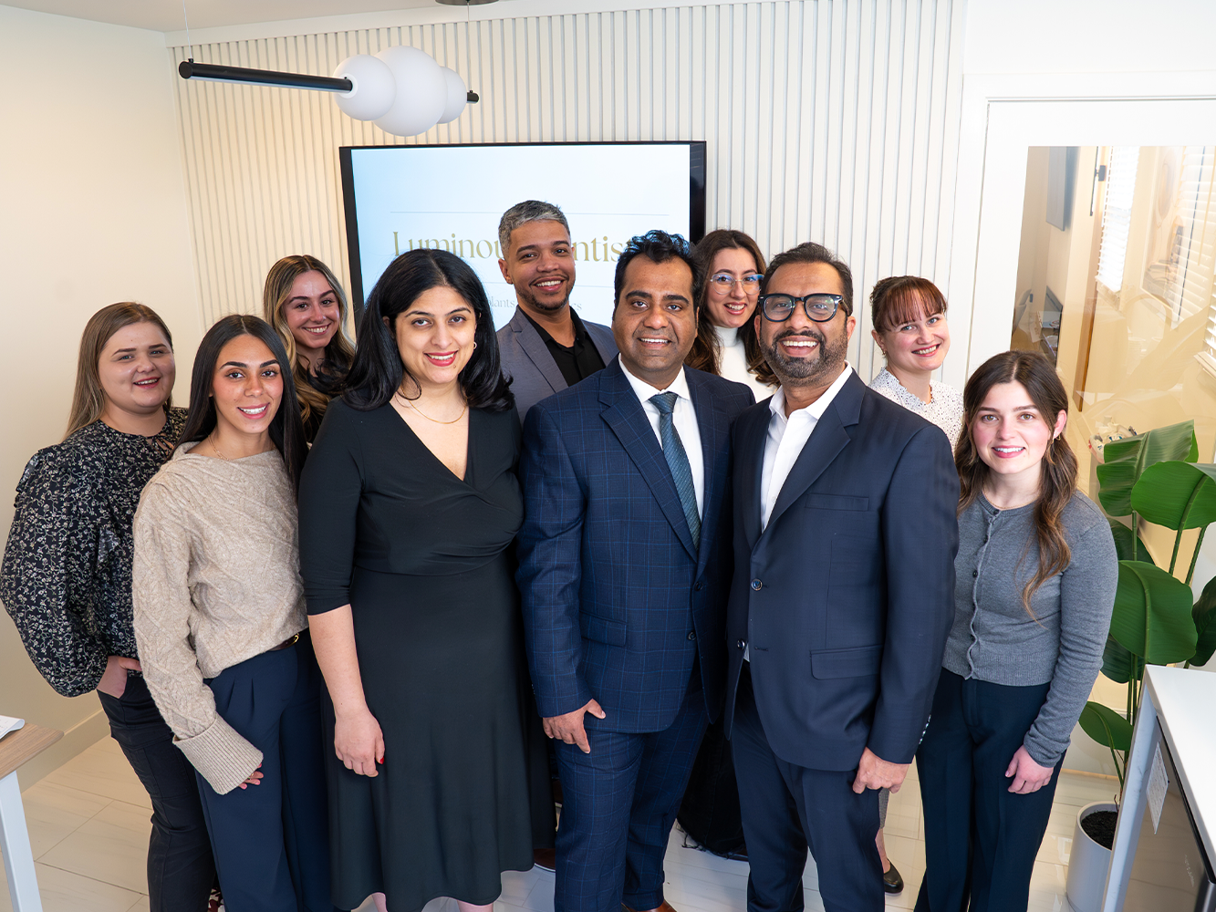 Team Photo in lobby at Luminous Dentistry